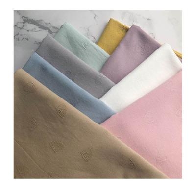 China Newly Designed Cotton Solid Color Shell Jacquard Fashion Garments Shrink-Resistant Fabric for sale