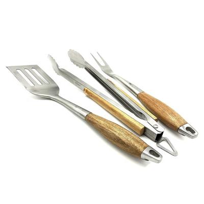 China Real Spatula BQ-2303 Easily Cleaned Stainless Steel Wooden BBQ Tool Kit Custom Logo 3pcs Heavy Duty Thick Fork Tongs for sale