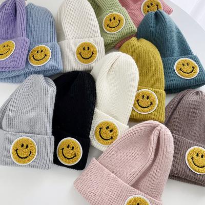 China breathable & New Waterproof Hat For Women Face Patch Smile Hat Knitted Beanie Couple Hat for sale