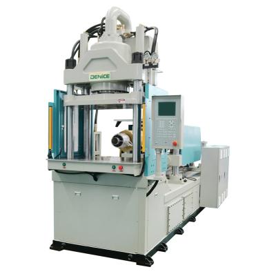 China VERTICAL high quality vertical ball rotor golf DK-2100 plastic injection molding machine for sale