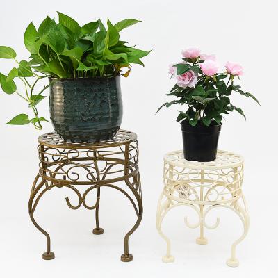 China Vintage Eco-friendly Cast Iron Balcony Living Room Flower Pot Display Stand Indoor Flower Pot Holder Metal for sale