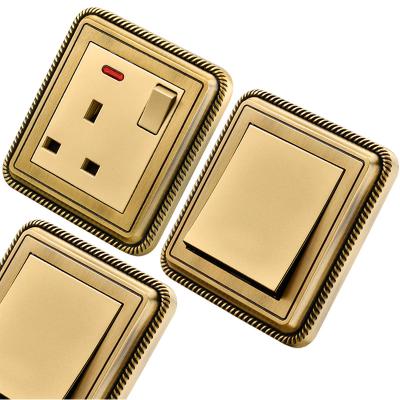 China Commercial UK standard 16A wall socket with gold copper wire drawing panel 250V socket and switch sharpening switch design for sale