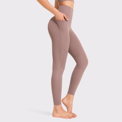 China 2021 hot sale anti-static high fashion girls sports wearing with pocket yoga pants for sale