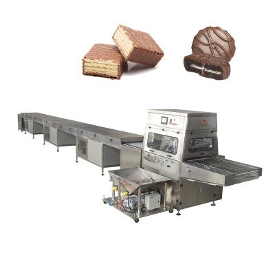 Cina Snack Factory Automatic Small Chocolate Enrobing Line Equipment Machine Price in vendita