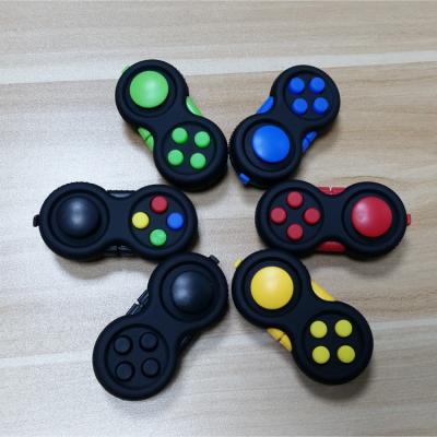 China 2021 Luxury New Design Hot Selling Fingertip Game Toys Silicone Button Decompression Grip for sale