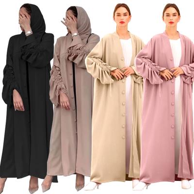 China New Fashion Dubai Middle East Long Sleeve Cardigan Women's Solid Color Quilted Muslim Long Dress for sale