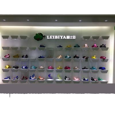 China Double-sided sports shoes show rack free interior design sports display stand for sale