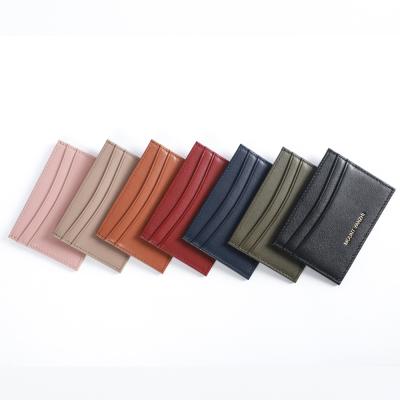 China NATIONAL Embossed Grain RFID Leather Card Holder Slim Credit Full Logo ID Card Holder Wallet Bow Shaped Wallet for sale