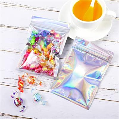 China Moisture Proof In Running Seal 3 Side Resealable Smell Proof Small Metallic Mylar Aluminum Foil Zip Lock Metallic Black Holographic Plastic Bag for sale