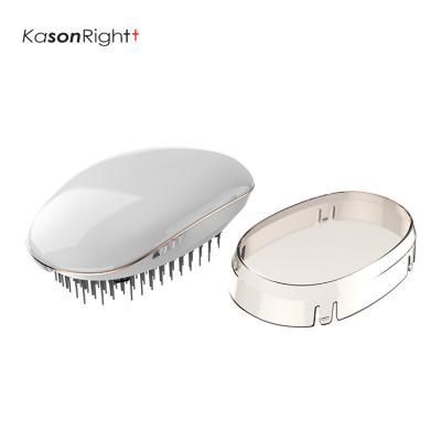 China Portable Hot Selling Compact CE, / Fancy Round Battery Ionic Brush Comb Hair For Girl Men for sale