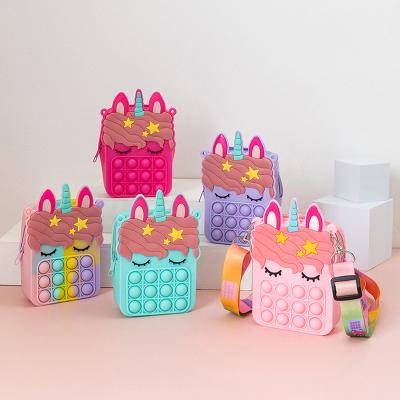 China New Cute Fashion Baby Decompression Unicorn Silicone Backpack Children Cross Change Single Shoulder Bag for sale