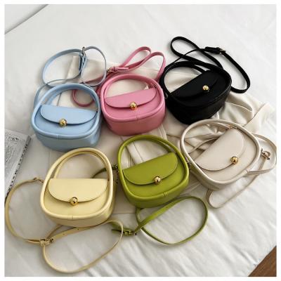 China Fashion New Fashion Wholesale Solid Color Small Simple Round Cross Shoulder Lady Bags - Body Messenger Bag for sale