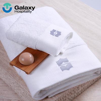 China Compressed Cotton Jacquard Hotel Swimming Pool Use Bath Towel High Quality Linen Hand Towel and Warm Face Towel for sale