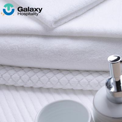 China Wholesale Compressed Customized Hotel 100% Cotton Bath Towel Five Star Hand Towel With Logo Face Clean Towel for sale