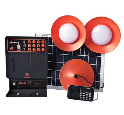 China Home Pay As You Go Solar Lighting Kit PAYG Portable Solar Charging System With 4 LED Lights FM Radio 5V USB Port for sale