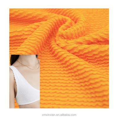 China Breathable Knit Jacquard Pleat Stripe Stretch Cotton Seersucker Fabric For Swimwear Bikini Customized Color for sale