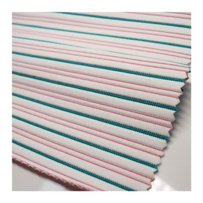 China Stripe Shrink-Resistant Fabric Jacquard Custom Knitted Yarn Dyed Fabric For Swimwear Sports Bikini for sale