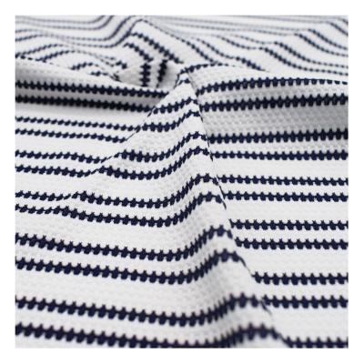 China Breathable stripe top fabric for swimwear bikini yarn dyed knitted cotton seersucker jacquard stretched fabric for sale