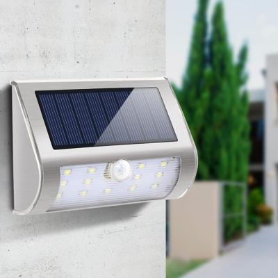 China Outdoor Waterproof Garden Fteck Stainless Steel Outside Solar Power Motion Sensor Wall Mounted Lights Garden Outdoor Led Wall Lamp for sale