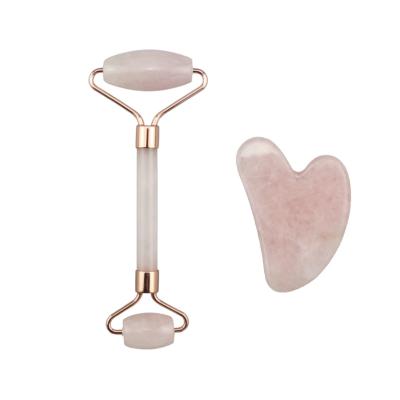 China Skin-Friendly Beauty Face Mini Pink Jade Massager Makeup Tool Jade Rolling Facial Roller for sale