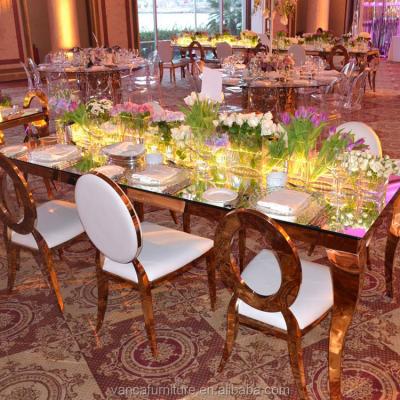 China Stainless Steel (Others) Adjustable Dining Room Furniture Golden Legs Mirror Glass Tops Wedding Tables Sets for sale