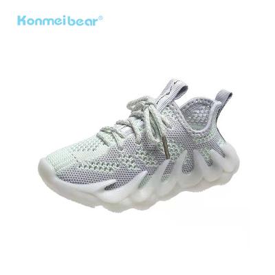 China Massage Newest Style Boys Girls Breathable Coconut Sneakers Lace Up School Flying Kids Knit Sports Shoes for sale