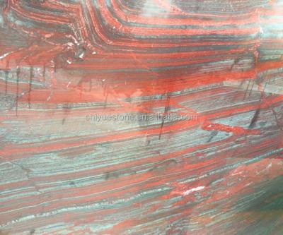 China Red Wall Iron Granite Slabs for sale