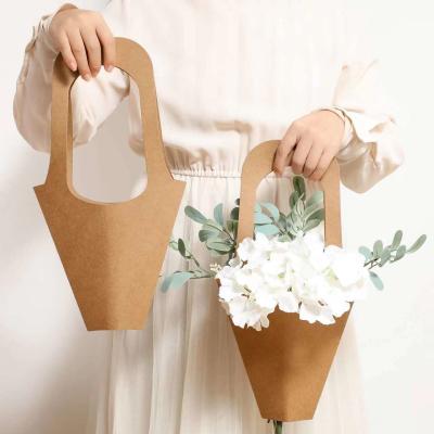 China Custom Color Accepted Craft Flower Carrier Bouquet Packaging Kraft Paper Bag For Flower for sale