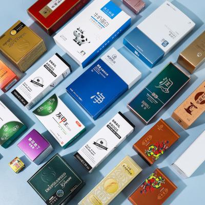 China Condoms Custom Printed Cardboard White Card Paper Medicine Packaging Folding Paper Box for sale