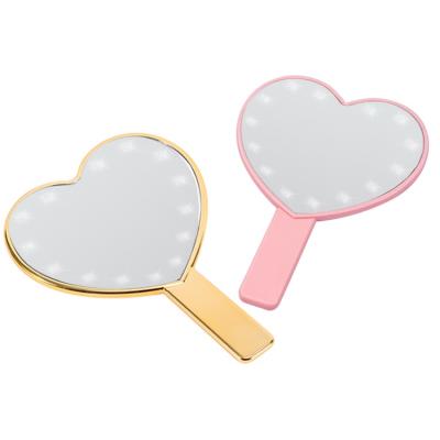 China Lit Small Lit High Quality Fasion Pink Fasion Makeup Travel Mirror Custom Personalized Portable Heart Led Hand Mirror for sale