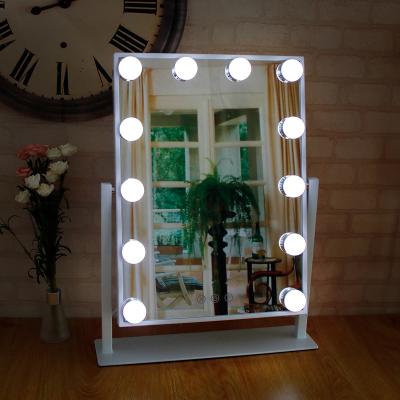 China Dimest Lighted Cosmetics Vanity Mirror Touch Desk Makeup Mirror With 12 Bulbs Vanity Hollywood Light Led Compact Make Up Mirror for sale