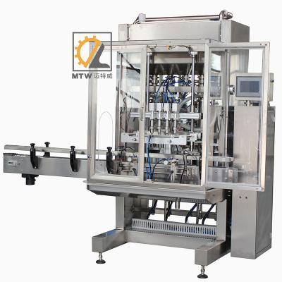 China High Quality Engine 4 Heads MTW Chemical Filling Machine Electric Auto Lubricating Car Bottling Oil for sale