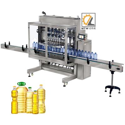 China High Efficiency MTW Pneumatic 1000ml Multiple Nozzle 4 Liter Liquid Filling Machine With Feeder for sale