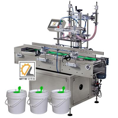 China High Quality Full Automatic Linear Type Food MTW Gravity Type Chemical Fertilizer Pesticide Liquid Bucket Filling Machine for sale