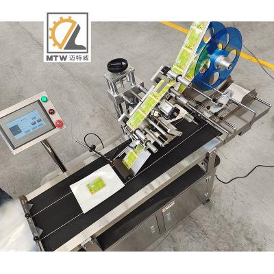 China High Quality PLC+Touch Screen MTW Flat Surface Pocket Applicator with Paging Machine Bag Labeling Machine for sale