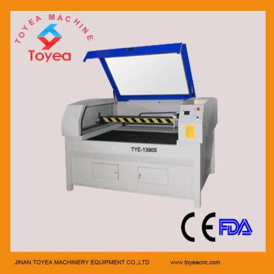 China China Auto Feeding laser Cutting machine for sportsweare print fabric TYE-1390S for sale