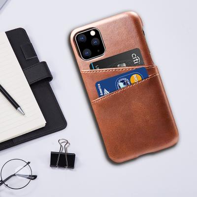 China 2020 Wholesale Premium Leather Magnetic Credit Card Wallet Mobile Phone Card Holder Wallet For Phone 12 for sale