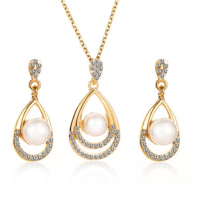 China TRENDY Fashion Imitation Pearl Bridal Jewelry Set For Women Romantic Rhinestone Necklace And Drop Earrings Dangle Set for sale