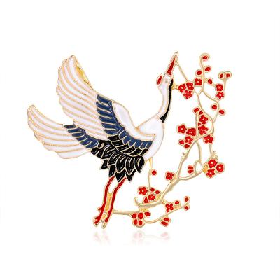 China New Fashion Elegant Chinese Style Animal Brooch Dress Decoration Alloy Gold Plated Enamel Plum Blossom Crane Brooches For Women for sale