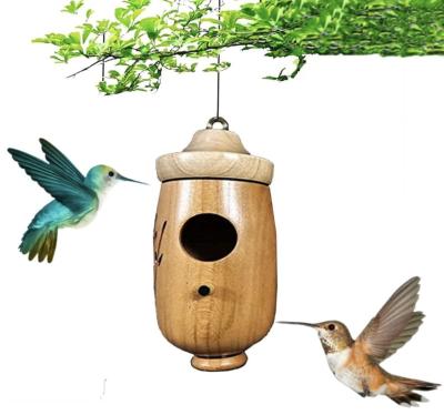 China Windproof Wooden Hummingbird House For Outdoors For Wooden Nesting Flower Carving Outdoor Hanging Bird's Nest for sale