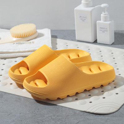 China Light Weight Stock wholesale thick bottom bathroom slippers female summer leaky hollowed-out indoor deodorant bath home slippers male for sale