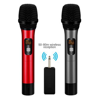 China Xiexunda Handheld U-stage Microphone Wireless Microphone One With Two Karoke MIC Wireless Microphone Handheld Household MIC for sale