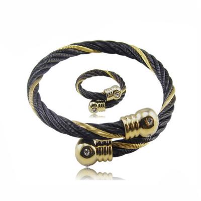 China Twisted Cable Design Stainless Steel Wire Bracelets Ideas With Two Tone for sale