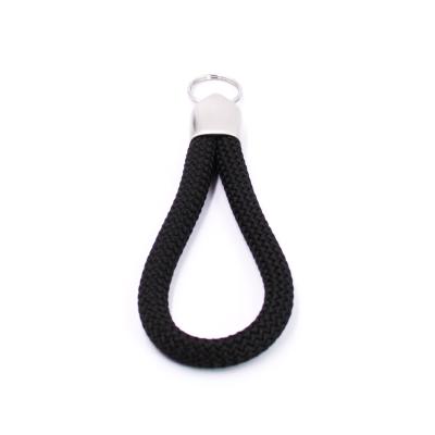 China Handmade Braided Keychains Nylon Rope 8mm Black Color Key Chain Car Logo Keyrings for sale