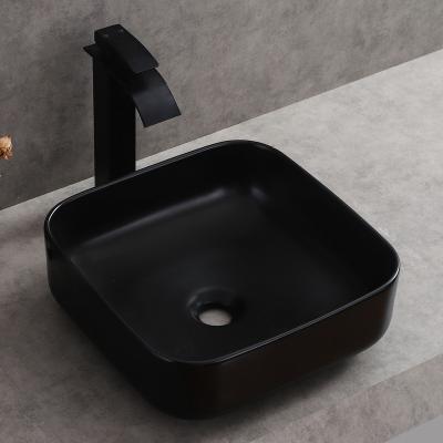 China Chaozhou factory export easy clean goods matte black square ceramic washbasin delicate appearance art basin for sale