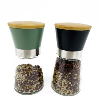 China Viable New Arrival Manual Salt Pepper Shakers Grinders Seasoning Empty Spice Glass Bottle Jars With Grinder Top for sale