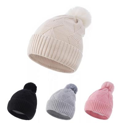 China Big Fur Ball Fur Ball Toque Core Solid Color Woolen Winter Women Winter Women Yarn Spun Knitted Plush Warm Beanies for sale