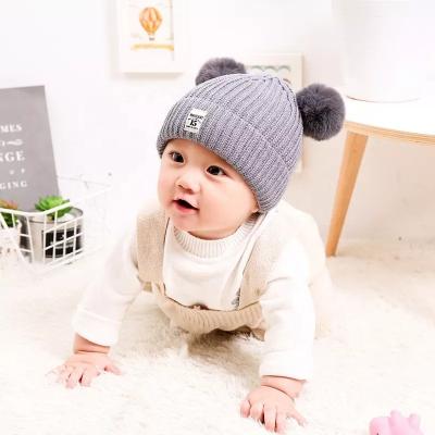 China Wholesale COMMON Fuzzy Ball Pom Pom Beanie Winter Wool Hat Baby Double Caps Infant Toddler Knitted Warm Hats for sale