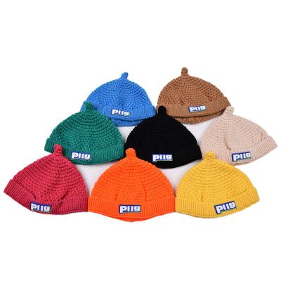 China New Trend COMMON Alphabet Baby Wool Knitted Super Cute Kids Beanie Warm Hats Solid Color Cap Kids Pacifier Hat for sale