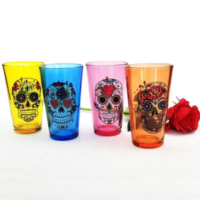 China Custom Fancy Skull Printed Beer Glass 16oz Colored Wholesale Clear Glassware Pint Glass Craft for sale